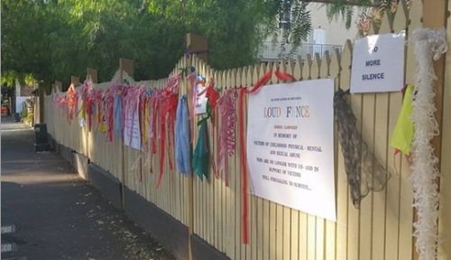 Ribbons on the fence of Bidura, prior to their being removed (Photo: P.Vernon)